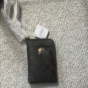 Coach Black Leather Pouch with Gold Accent